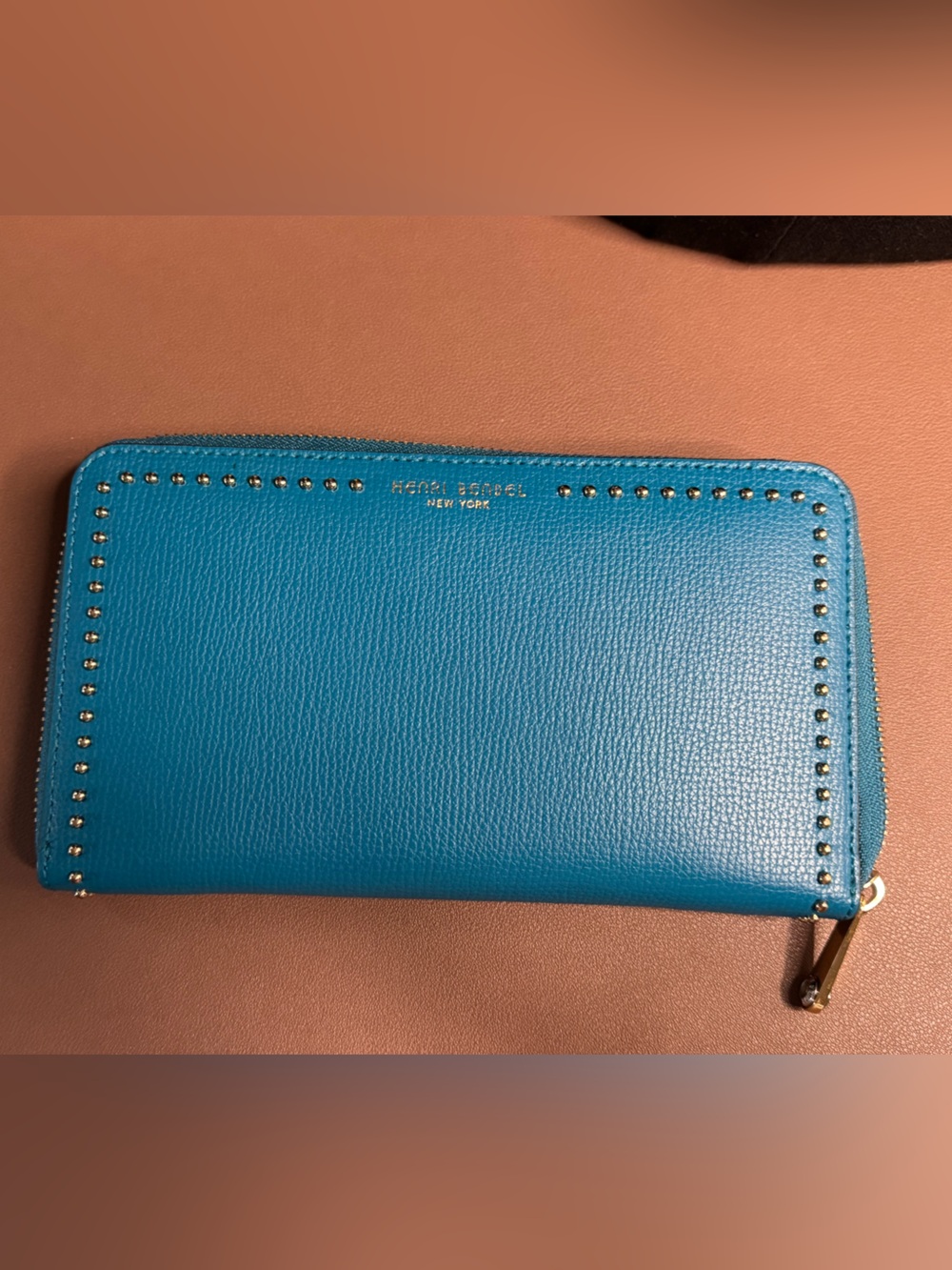 Henri Bendel NY large teal blue wallet.